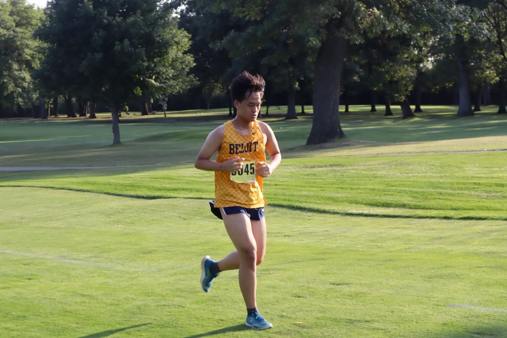 Vu-Anh Le running in a cross-country race